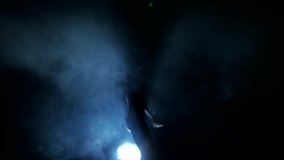 Dancing silhouettes of woman in a nightclub. - Powered by Shutterstock - Get 15% off with code: PIKWIZARD15