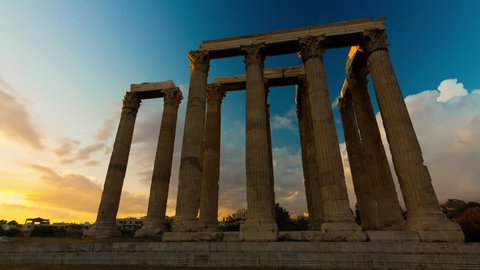 4K Motion controlled sunset Timelapse of pillars In the temple of Olympian Zeus in Olympeion of Athens Greece.
Beautiful blue sky and clouds passing over. Acropolis to the left.