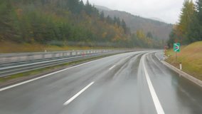 Front view of the highway from the cabin of the transport truck