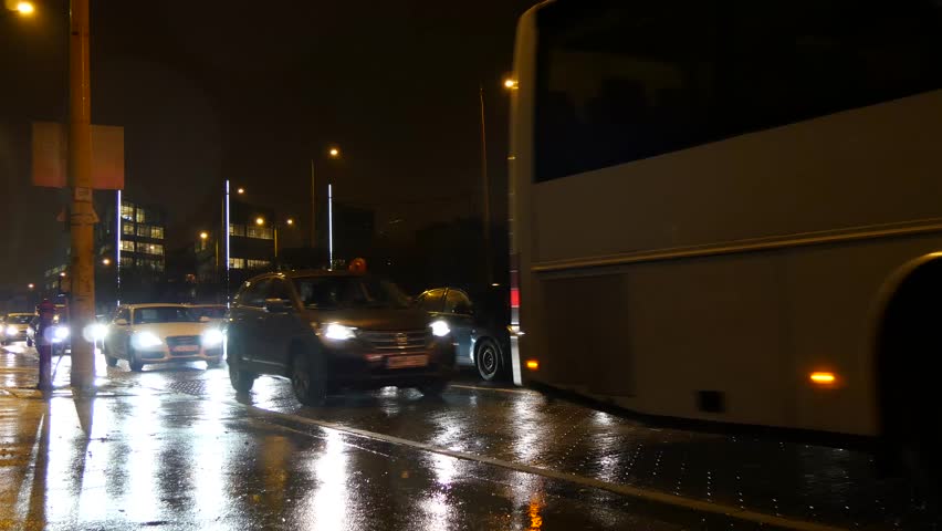 BUDAPEST - DECEMBER 02: Traffic in Budapest closeup at rainy and cold winter night December 02, 2014 in Budapest, Hungary.  | Shutterstock HD Video #8124505