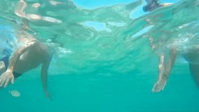 Underwater kiss ; Underwater kiss, loving couple in the sea,video clip