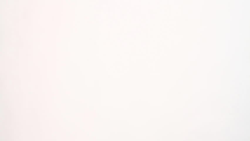 Sexy brunette blinking, wearing pink bikini