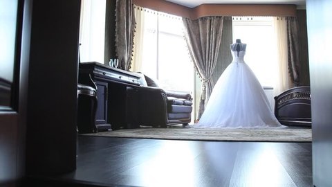 Wedding dress, offer, hotel, doors open, hitting the camera