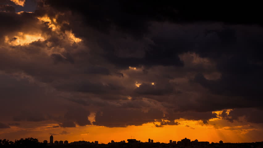 Time lapse of Sunset And Storm Clouds Over Tel Aviv And Ramat Gan,  City Silhouette In Background | Shutterstock HD Video #8149693