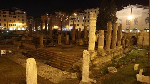 area sacra Roman ancient ruins in Largo di Torre Argentina square by Night, Rome, Italy