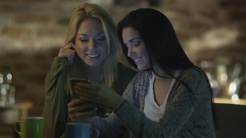Two Smiling Girls are Watching Photos on Smartphone. Casual Lifestyle.
Shot on RED Cinema Camera in 4K.
ProRes codec  - Great for editing, color correction and grading.
