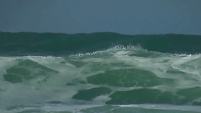 Big ocean waves in slow motion