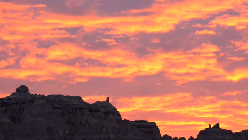 Beautiful Sunset in Badlands National Park near Notch and Window Trail -South Dakota Raw Slow pan from left to right along the ridge