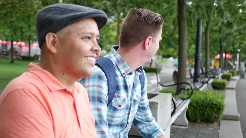 Two friends looking at tablet