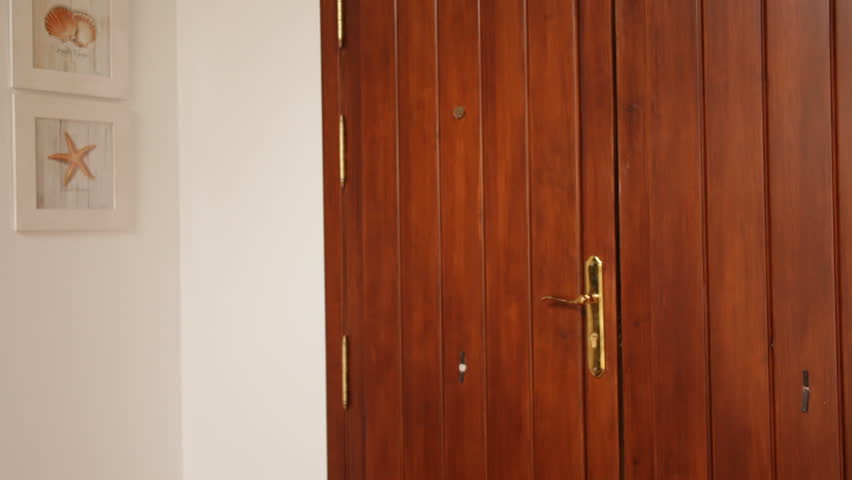 Couple Entering Villa