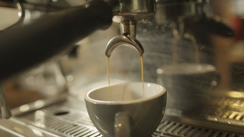 Preparing and serving fresh coffee at an upmarket cafeteria 