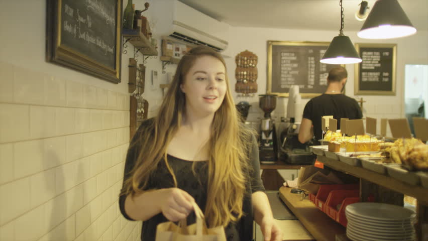 Customers buying food and drink. Small Coffee House business making refreshments for passing customers. | Shutterstock HD Video #8172700