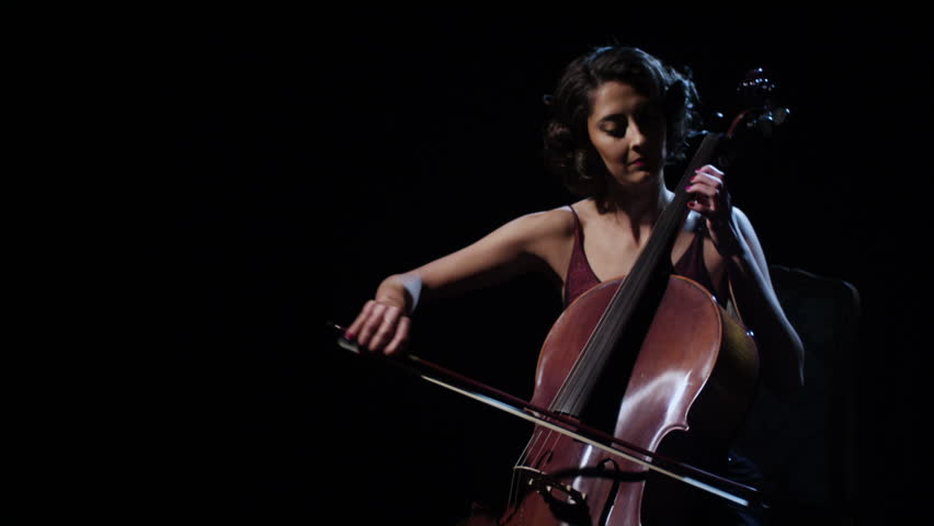 A young  cellist  plays her instrument. 