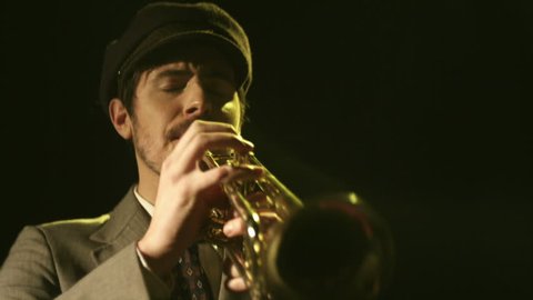 A young saxophonist plays his instrument.  Stock Video