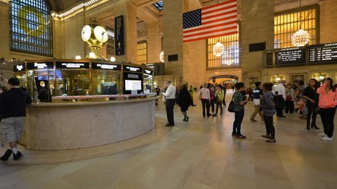 NEW YORK CITY, USA - JUNE 10: View of the Grand Central Station in New York City with commuters walking in time lapse, USA on June 10th, 2013.