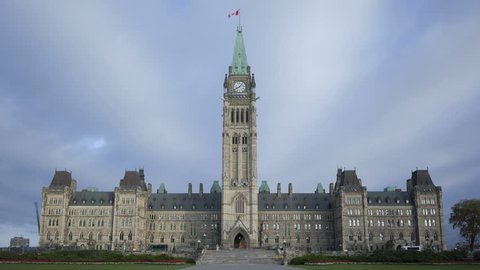 Time lapse Parliament Hill building closeup in Ottawa, Canada at daytime mit clouds passing by