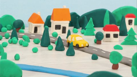 Building new road and houses - city planning concept - plasticine city, houses, road, cars (see also other videos from this plasticine series) - stop motion animation