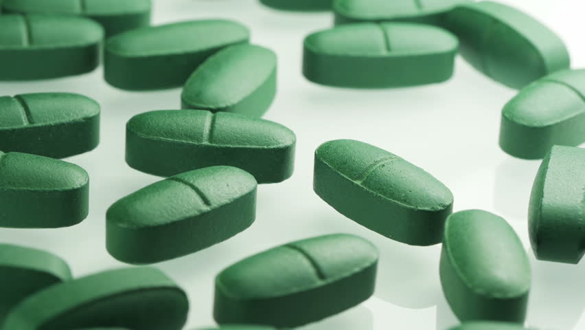 Video Stok green tablets macro shot few pills (100% Tanpa Royalti) 8198335 ...