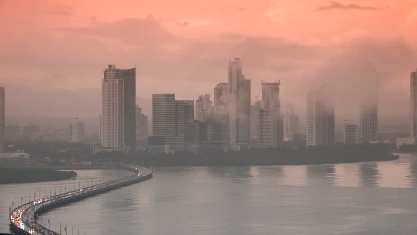 Central America and emerging Countries with skyline view of Costa del Este in Panama City and traffic on highway at sunset. 4K, Ultra HD, UltraHD, UHD | Shutterstock HD Video #8205685