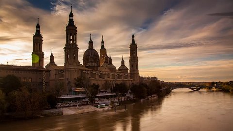 Basilica del Pilar, Cathedral of Our Lady of the Pilar next to river Ebro, timelapse transition from day to night. 