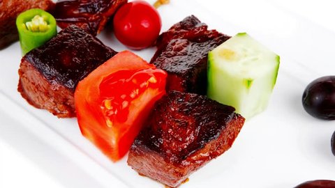 european food: grilled beef meat china plate with olives and tomatoes 1920x1080 intro motion slow hidef hd