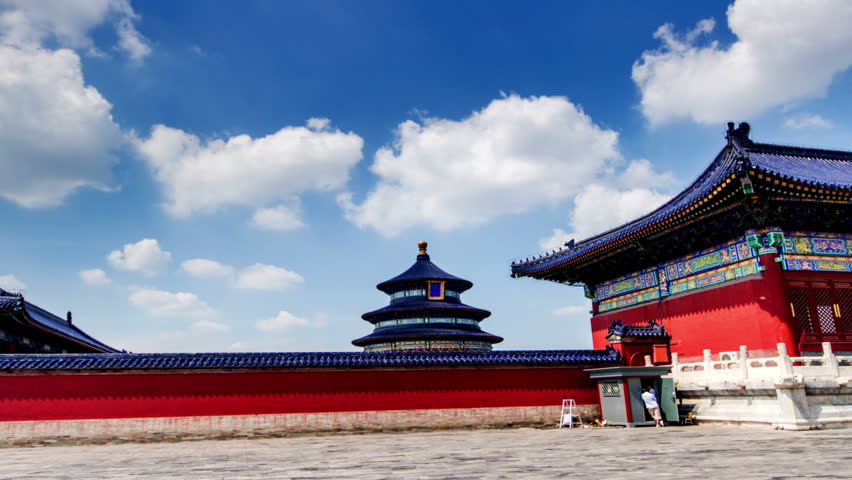 Walking along the red wall in the Temple of Heaven,Beijing,China