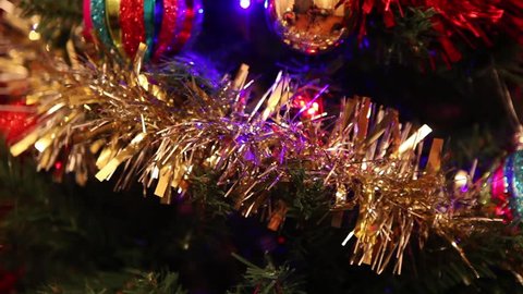 Christmas tree decorations, balls, tinsel and lights