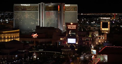LAS VEGAS, USA - APRIL 28, 2013 Establishing Shot Aerial View Mirage Hotel Las Vegas Skyline Night Lights Cars Traffic Busy Street ( Ultra High Definition, Ultra HD, UHD, 4K, 2160P, 4096x2160 )