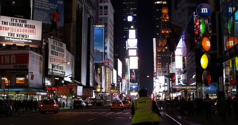NEW YORK CITY, USA - APRIL 23, 2013 Crowded Cars Traffic Broadway NYC Yellow Cab Motion Bus Night Light Times Square ( Ultra High Definition, Ultra HD, UHD, 4K, 2160P, 4096x2160 )