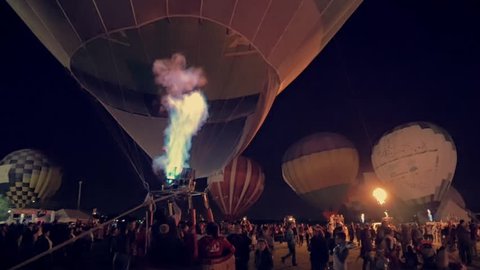 LEON, MEXICO 15 NOVEMBER 2014: Illumination show of hot air balloons lighting te burners  at night during the Festival Internacional del Globo 2014. 