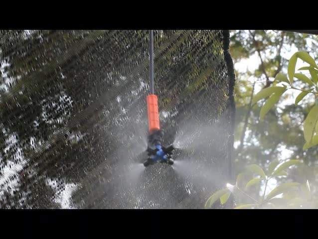 sprinkler shooting water