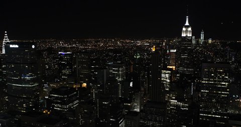 NEW YORK CITY, USA - APRIL 23, 2013 Establishing Shot Nightfall Lights New York City Downtown Skyline Aerial View Modern Skyscrapers ( Ultra High Definition, Ultra HD, UHD, 4K, 2160P, 4096x2160 )