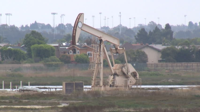 Oil Rig Adjacent To Suburban Neighborhood