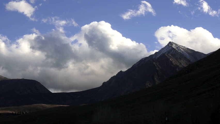 Soft White Clouds Pass By High Peak Sierra Nevada Range