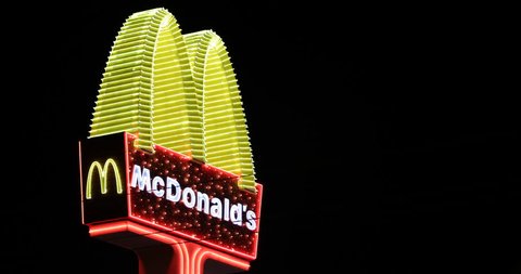 LAS VEGAS, USA - APRIL 28, 2013 McDonald's Restaurant Neon Electronic Sign Fast Food Chain Logo Night Light Icon ( Ultra High Definition, UltraHD, Ultra HD, UHD, 4K, 2160P, 4096x2160 )