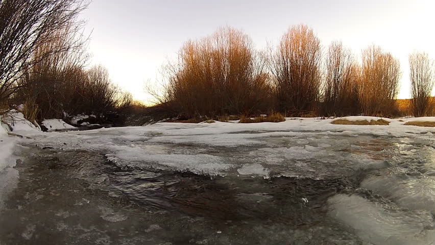 Close up view of icy river in mountain scene