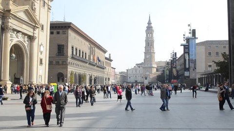 ZARAGOZA, SPAIN, NOVEMBER 1, 2014: People are walking through plaza del pilar in spanish city zaragoza, which is famous also for its basilica del pilar.