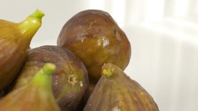 Juicy organic figs close-up food background panning 4K 2160p UHD footage - Tasty figs on white organic food 4K 3840X2160 UHD video