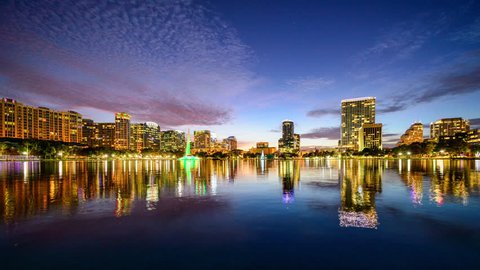 Orlando, Florida, USA downtown city skyline on Eola Lake.