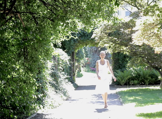 Woman walking in the park - NTSC