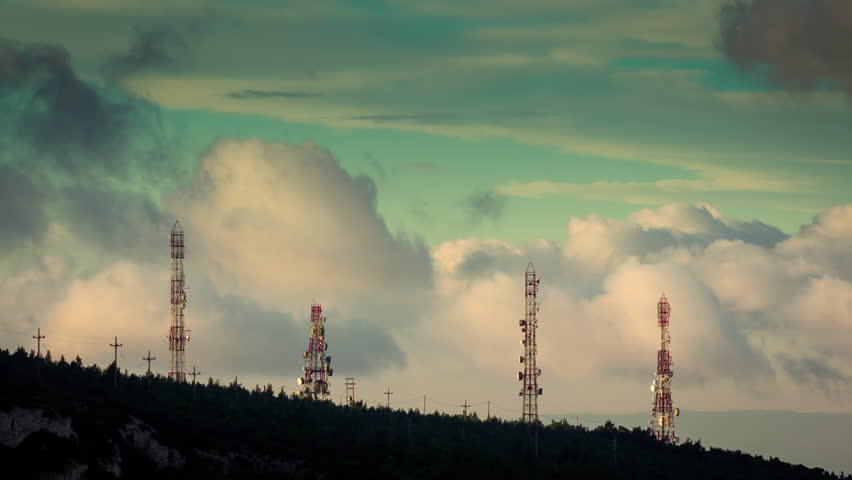 4K timelapse of communication and broadcast towers at the top of a mountain at sunrise with clouds passing low.
Sequence has been de-flickered and all unwanted elements  have been digitally removed..