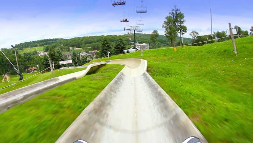 Riding an alpine slide.  Rider perspective.