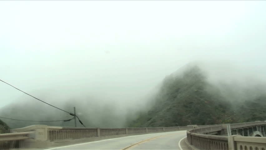 POV shot of driving the coastal Cabrillo Highway fast motion