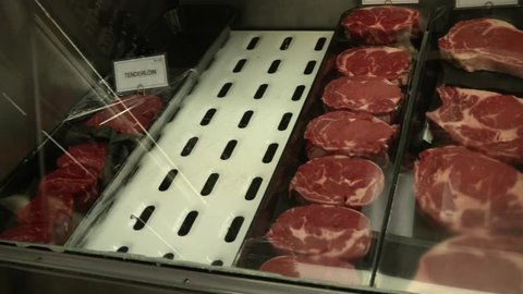 Butcher Shop Close up - Steaks in Refrigerator