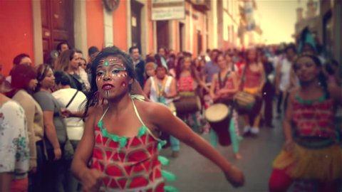 GUANAJUATO, MEXICO CIRCA MARCH 2014: African dance group performing on the crowded street during a Celebration of cultures.