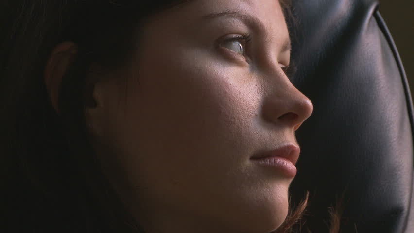 Side view portrait of young woman gazing | Shutterstock HD Video #836683
