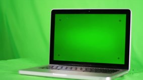laptop on the green screen