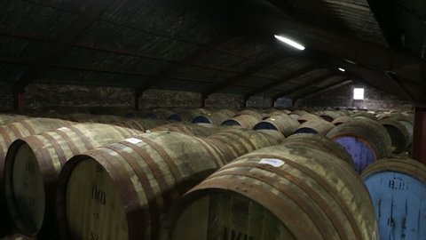 Jib shot of Whisky barrels in a warehouse