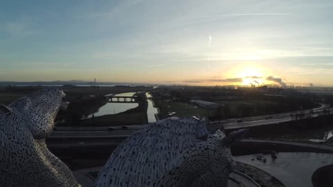 FALKIRK, SCOTLAND - JUNE 2014: Aerial shot of the Kelpies horse heads at the Helix park in Falkirk, Scotland during sunrise