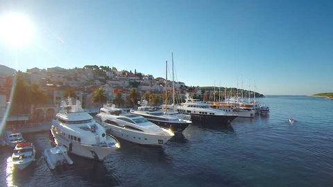 Hvar Island, Croatia was named as Lonely Planet's number 5 destination for 2012 and Conde Nast voted it among the top ten islands in Europe. This aerial drone overhead footage is of the main harbor.
